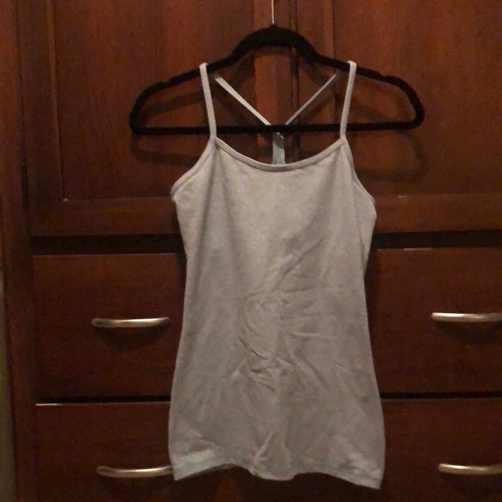 Heather blue Lululemon yoga top with built in bra, cups included